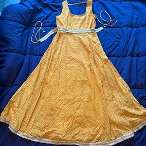 Elegant Yellow Gown with Silver/Gold Accents